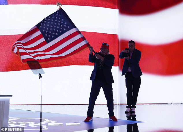 Hulk Hogan took the stage holding the American flag after declaring himself a supporter of former President Donald Trump.