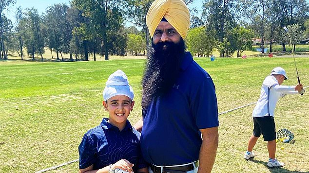 Gurmantar Gill, 11, with his father Daljinder Gill.