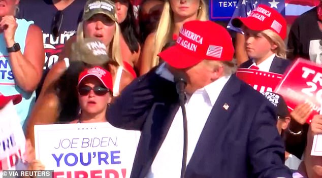 Trump's turn of his head to the right to look at the graphic on the screen during his rally is believed to have saved his life because the bullet that hit his ear was just inches away from a far more lethal impact.