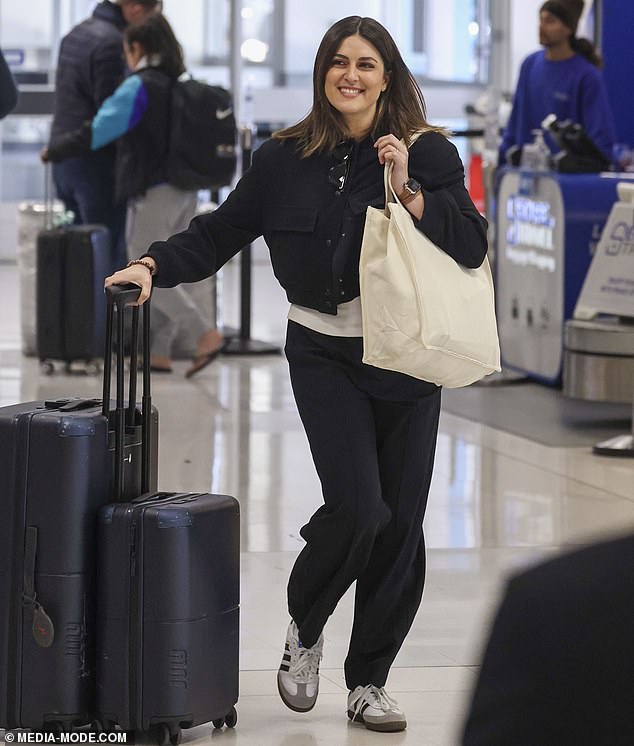 The Today show co-host sported a chic monochrome look in a black button-down jacket paired with a white T-shirt.