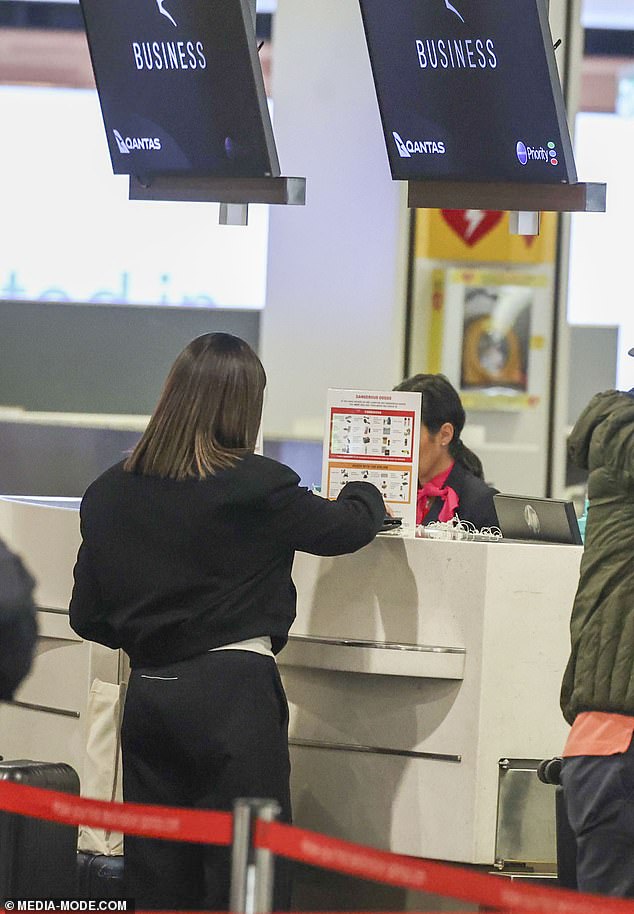 Sarah Abo was seen checking in to Business Class on the same flight.