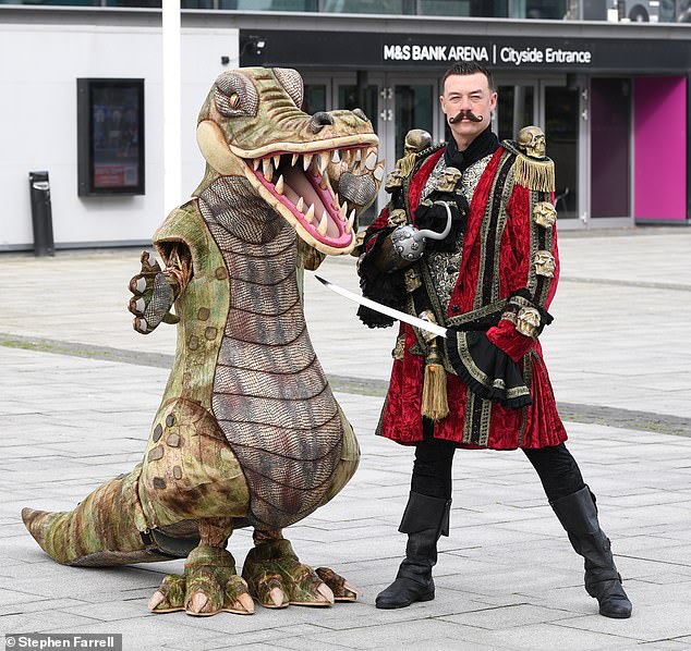 Kai put on a brave face and donned his Captain Hook costume and posed alongside his fellow cast members, with whom he will take to the stage at the city's M and S Bank Arena at Christmas.