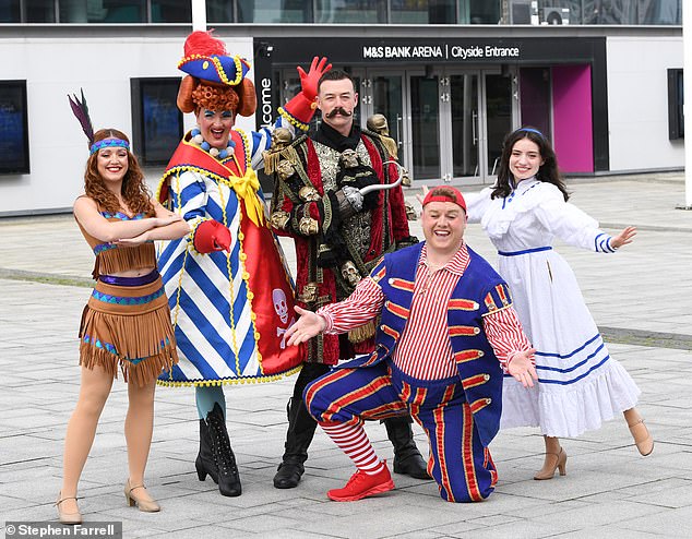 The Strictly star confidently posed in character and raised her hand in a hooked position while also brandishing a sword.