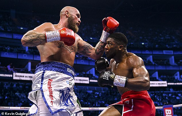 Helenius was last in action in August when he fought Anthony Joshua (right) at the O2 Arena.