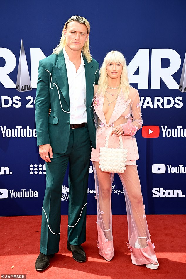 Salmin (pictured with Moore at last year's ARIA Awards) also said that she and the Magpies defender 