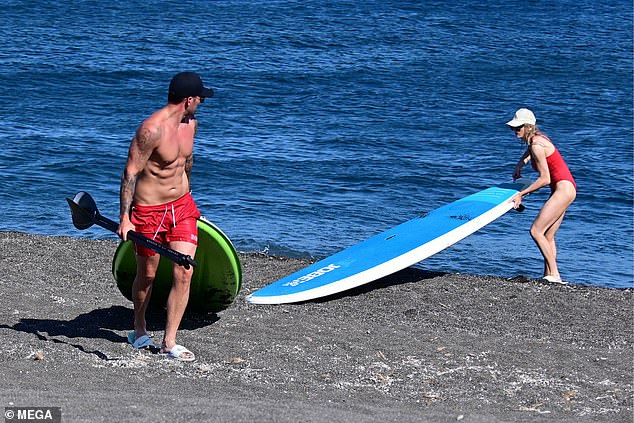 Then they dragged their board across the sand.