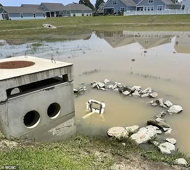 She claims that a poorly constructed stormwater pond has repeatedly flooded immediately.