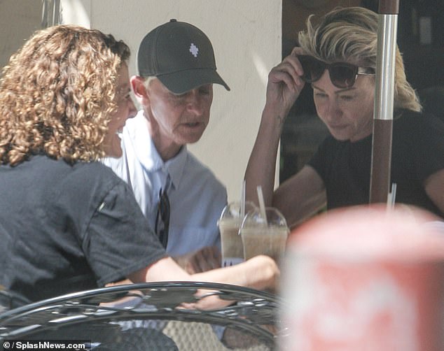 Portia and Ellen were seen joining their friends at an outdoor table at a local deli, enjoying some shade under umbrellas.