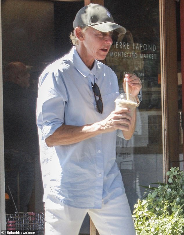 Ellen stayed true to her usual style, sporting a loose, short-sleeved button-down shirt with a baseball cap and shielding her eyes from the rays with a large pair of sunglasses.