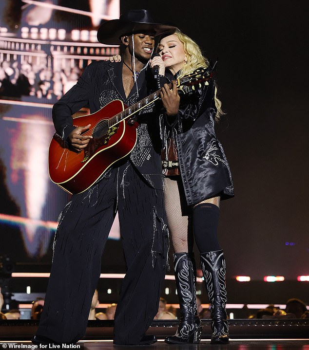 The guitarist notably joined the Material Girl hitmaker, who is worth around $600 million, on her Celebration Tour, which ended in May with a free concert in Rio de Janeiro; seen in October 2023 in London