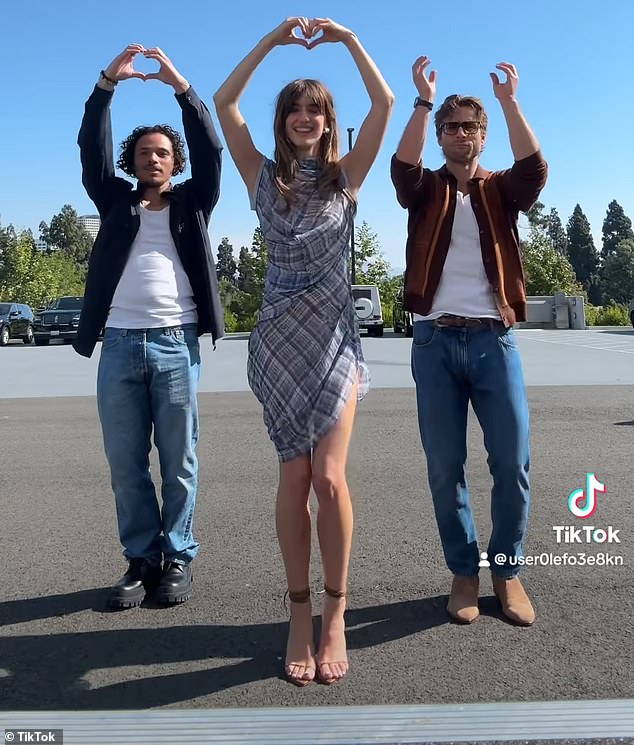 Daisy Edgar-Jones shared a video of herself and her co-stars Glen Powell and Anthony Ramos performing Charli XCX's viral TikTok dance to her hit song Apple.