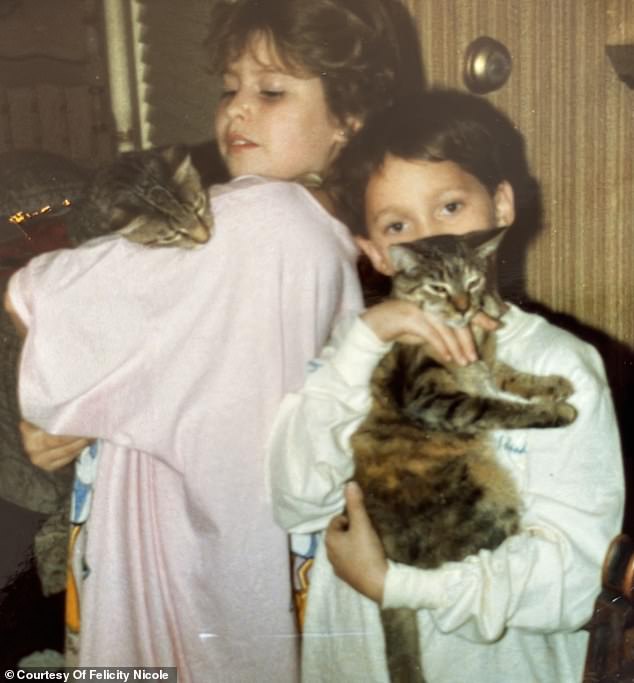 Her parents' marriage was tumultuous and as a result, so was Felicity's childhood with a sister and two brothers. Pictured here, Felicity with her brother Tommy and cats Frieda and Sammy.