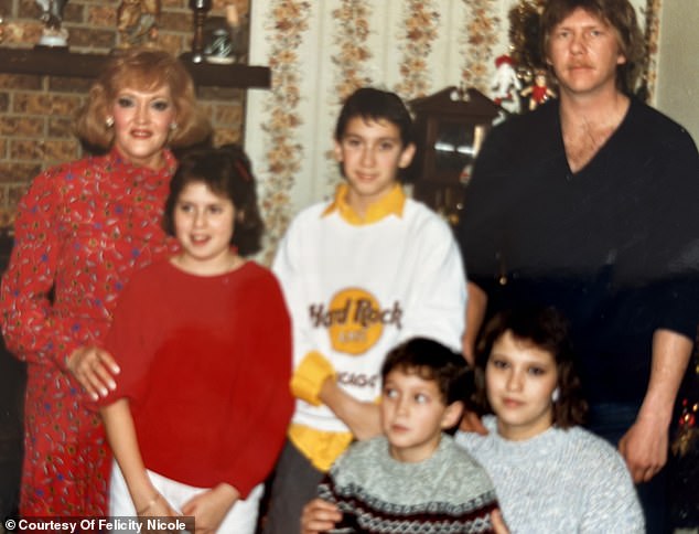 Felicity and her family and her sister's ex-fiancé, whom she still considers family, are shown here during Christmas when she was in fifth grade.