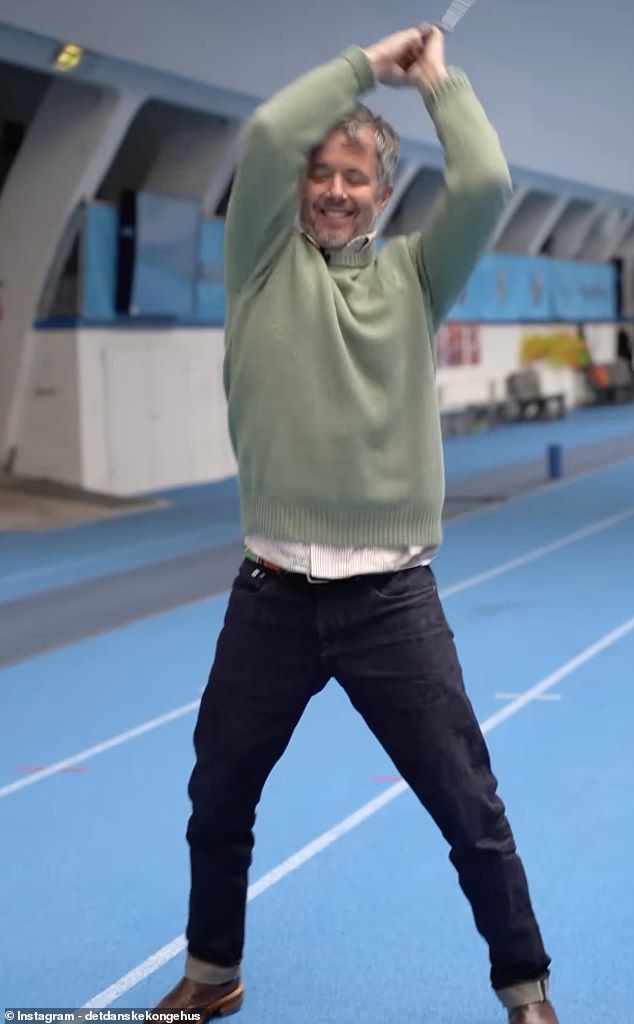 Pictured: Denmark's King Frederik giving hammer throw a try. The king's practice was supervised by Katrine Koch Jacobsen, the first female hammer thrower Denmark has sent to the Olympics.