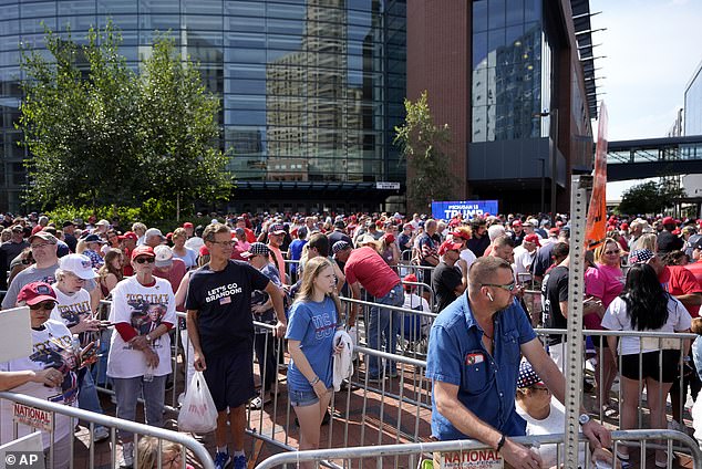 Trump supporters wait in line to enter Van Andel Arena. Security was heightened for Trump's rally in Grand Rapids. It was his first campaign rally since the shooting in Pennsylvania a week earlier.