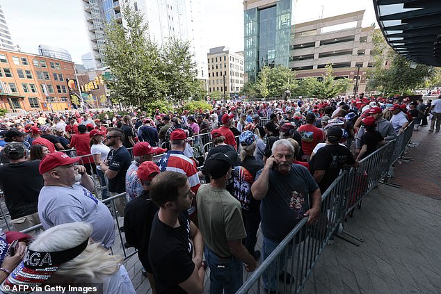 Supporters were not intimidated by the shooting and formed ranks of thousands.