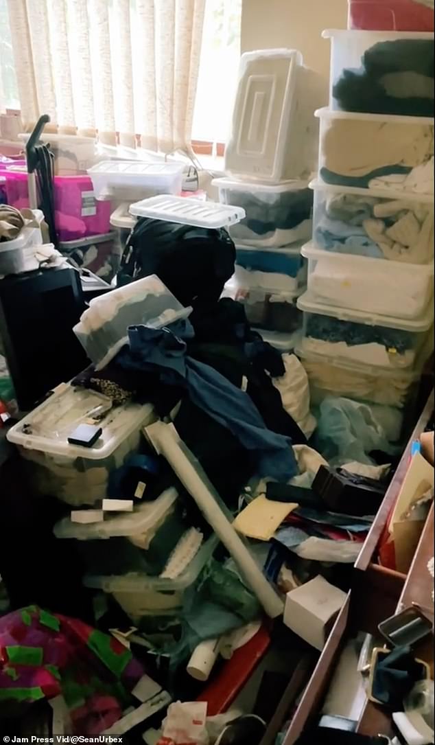 The rooms were completely filled with boxes of clothes, which had been stacked up to the ceiling.