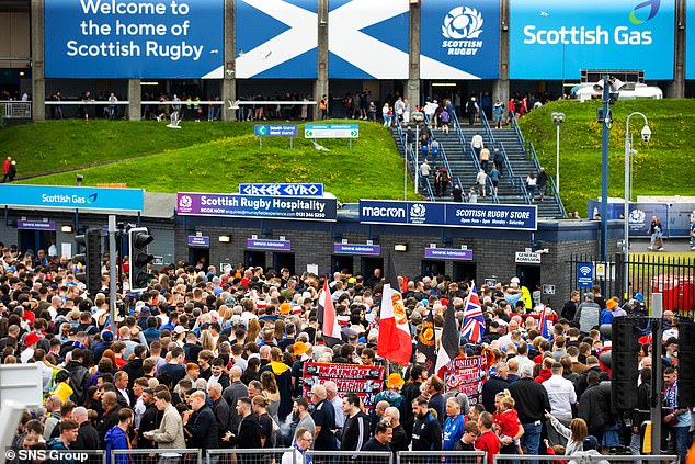 Groups of excited fans were stuck in queues at the turnstiles as they tried to enter the stadium.