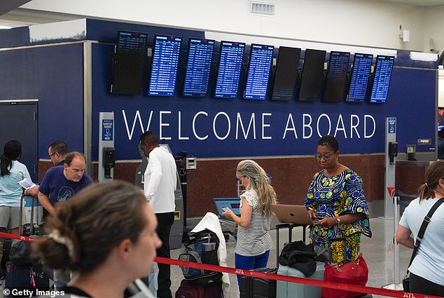 Those flying out of Hartsfield-Jackson Atlanta International Airport (pictured) are bearing the brunt of the chaos, with more than 150 flights, or about 14 percent, canceled and more than 30 percent delayed as of Saturday.