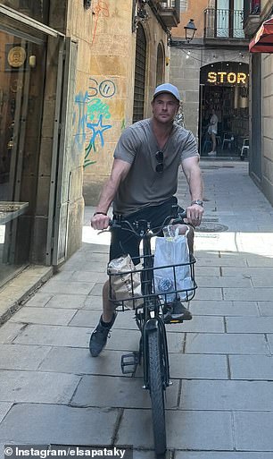 Elsa also shared snaps of Chris riding his bike around the city as they took in the sights.