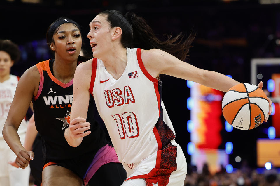 PHOENIX, ARIZONA - JULY 20: Breanna Stewart #10 of Team USA drives to the hoop over Angel Reese #5 of Team WNBA in the 4th quarter during the 2024 WNBA All-Star Game at Footprint Center on July 20, 2024 in Phoenix, Arizona. (Photo by Alex Slitz/Getty Images)