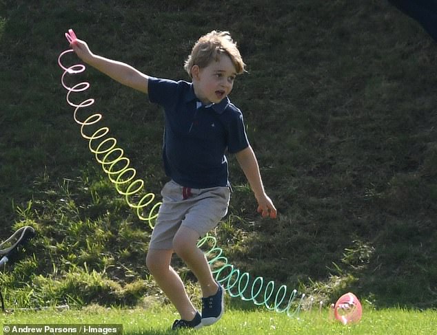 Prince George, then four years old, was quite fascinated by the slinky.