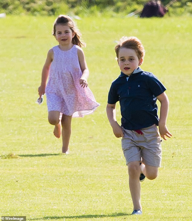 Charlotte runs barefoot behind her brother George during a family polo day at Beaufort Park, Gloucestershire, in 2018