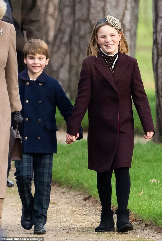 Louis and Mia Tindall, daughter of William's cousin Zara, walk hand in hand into a Christmas Day service at St Mary Magdalene Church, Sandringham, in 2023. William is Mia's godfather.