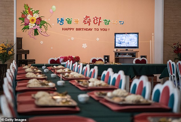 Food is served for a birthday at the Songdowon International School children's camp in 2018 in Wonsan, North Korea