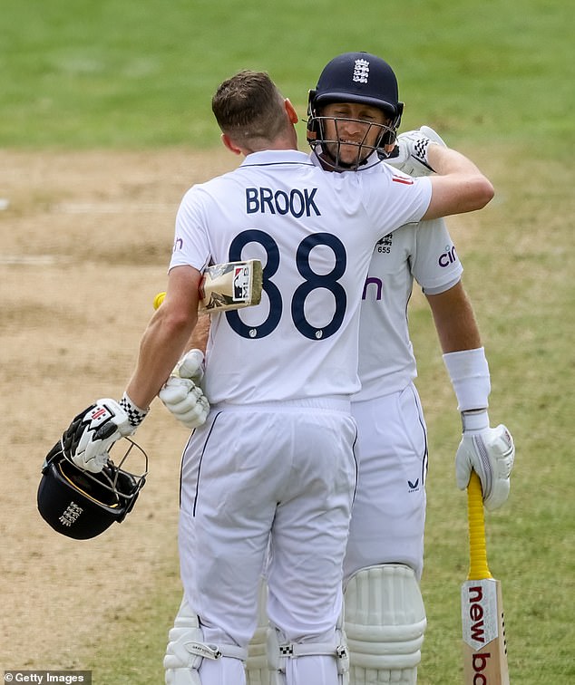 Harry Brook congratulated Root after reaching his half-century against the West Indies