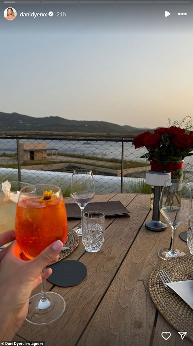 After the happy news, it was time to toast the happy news with a drink and Dani shared a photo of herself raising a glass of Aperol spritz.