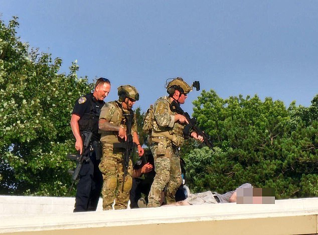 Crooks was shot dead by local authorities after he opened fire from a nearby rooftop.