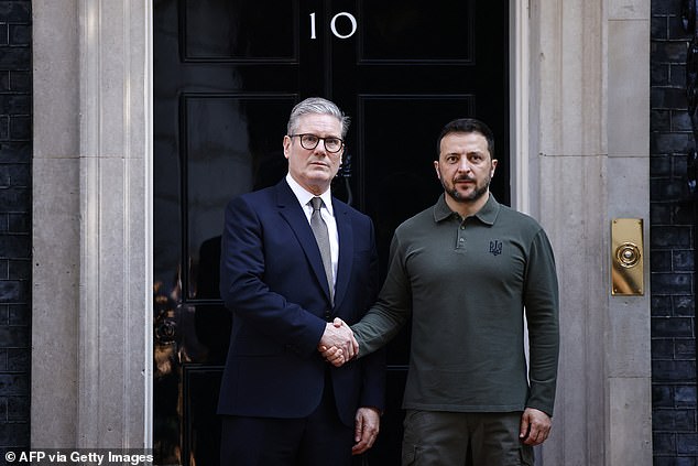 Keir Starmer shakes hands with President Volodymyr Zelensky on the steps of 10 Downing Street on July 19