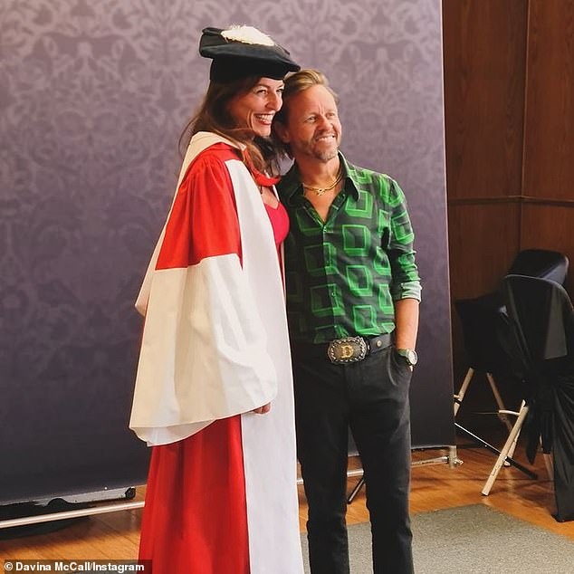 Davina McCall, 56, was overwhelmed with pride and love as she revealed that she and her eldest daughter Holly graduated in the same week (pictured with boyfriend Michael Douglas)