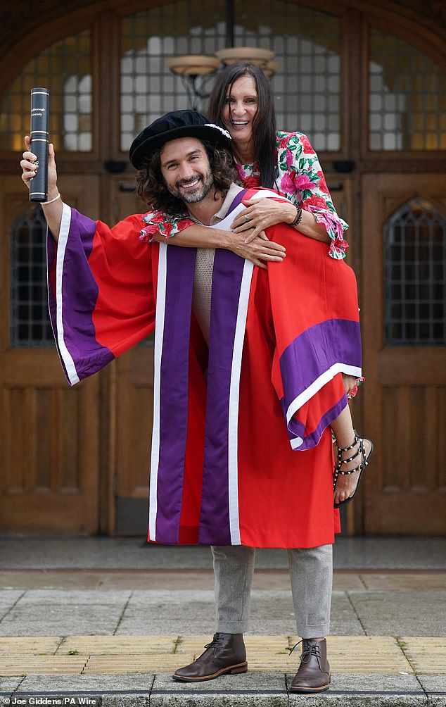 Joe Wicks celebrated with his proud mother on Tuesday after receiving an honorary degree from Loughborough University in Leicestershire.