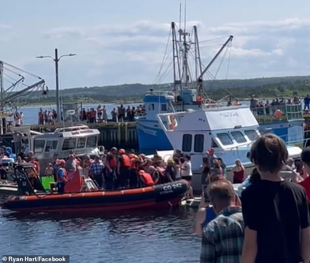 When the crew returned home on Saturday, they were greeted by hundreds of jubilant townspeople.