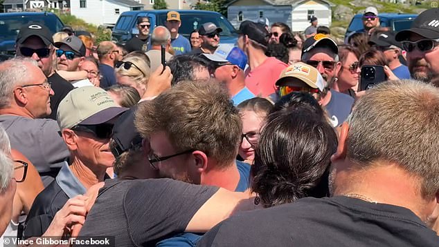 The fishermen were embraced by their tearful relatives, who were certain they were dead.