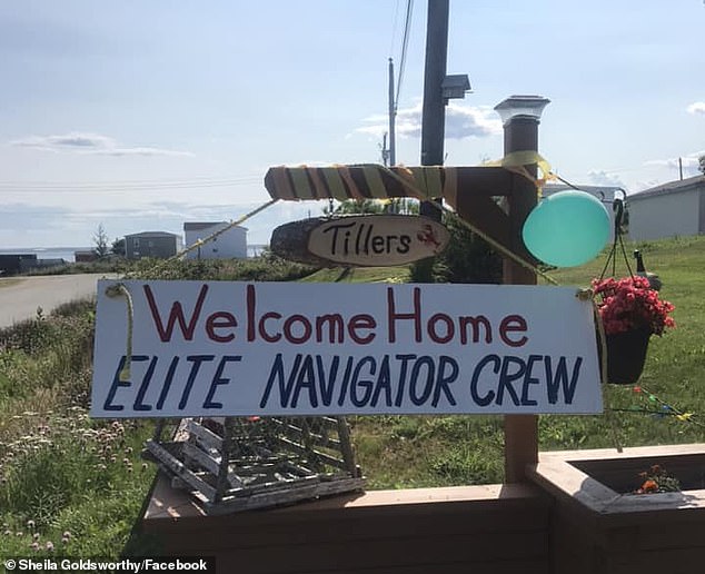 Crew members were greeted with welcome signs like this one.