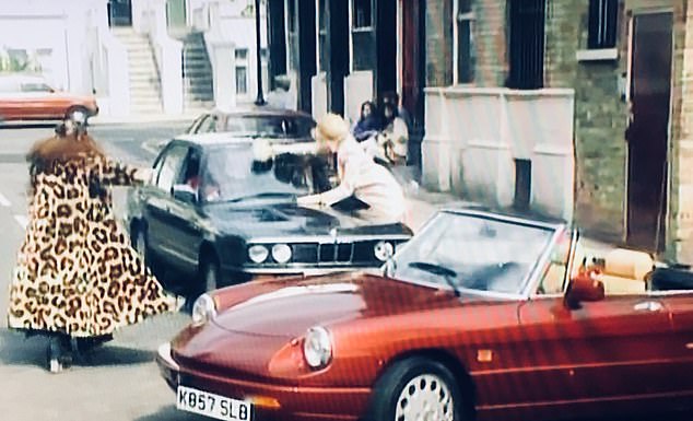 Jennifer Saunders and Joanna Lumley in Absolutely Fabulous, pictured next to the Alfa Romeo. In the episode, the car ends up being immobilized when they park on the pavement right in front of Harvey Nichols