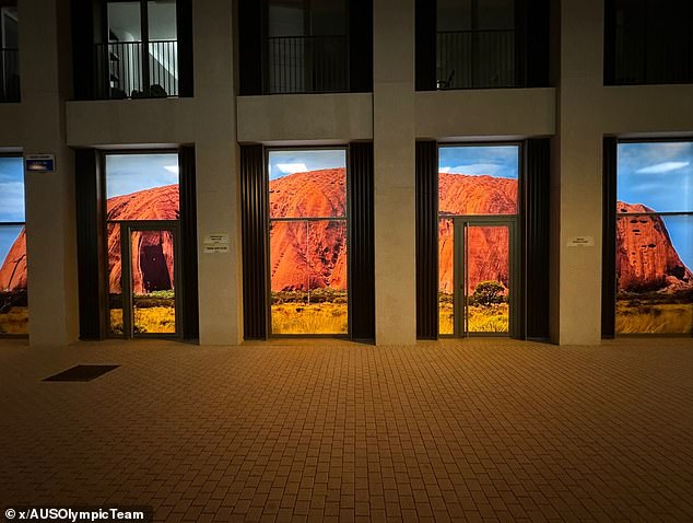 The Australian section of the athletes' village features several large images of iconic Australian locations.