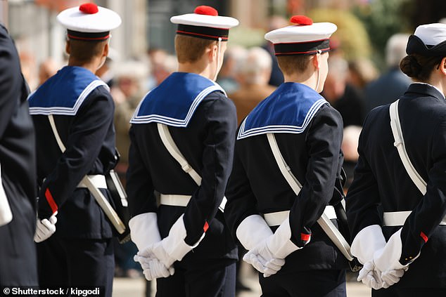 In some European countries, soldiers wore hats with pompoms to define their rank or which regiment they belonged to (stock image)