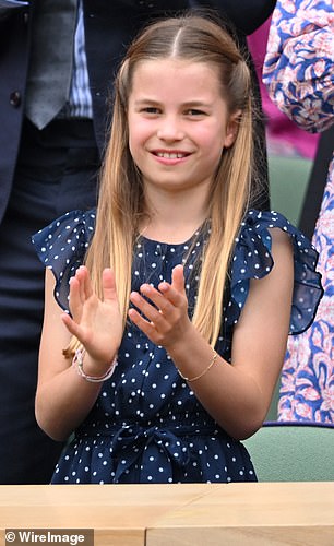 Made up of yellow and red thread, the sash appears to be similar to the versions worn by Her Majesty's nine-year-old granddaughter Princess Charlotte when she attended the Wimbledon final at the weekend with her mother, the Princess of Wales.