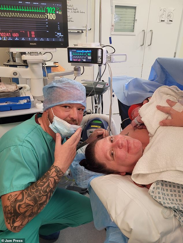 Danielle and her partner Tony (pictured), 39, both from Reading, are all smiles with their newborn baby boy Callum.