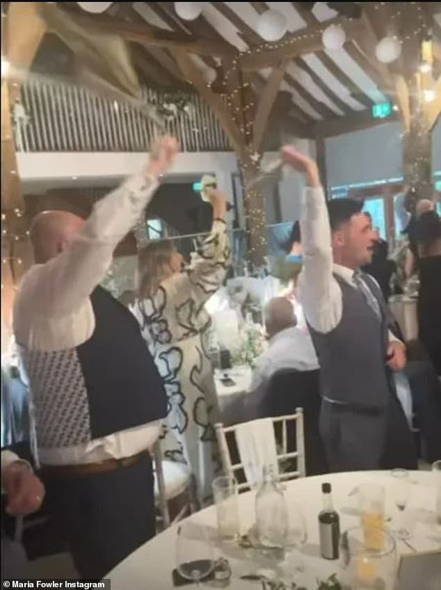 She shared a quick video of all the guests twirling their napkins as the newlyweds made their entrance.