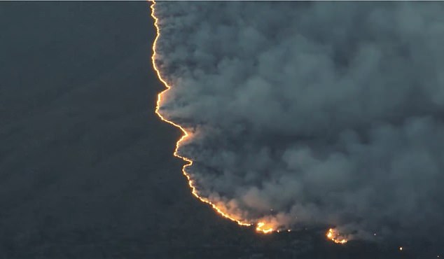 GREECE: In the mountainous area north of Falakro, a wall of flames has been burning grasslands for five days.