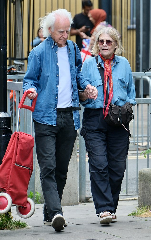 Julie looked much younger than her age, with her blonde hair styled in a sleek bob, while Duncan complemented her with a denim shirt of his own, dark jeans and matching Converse.