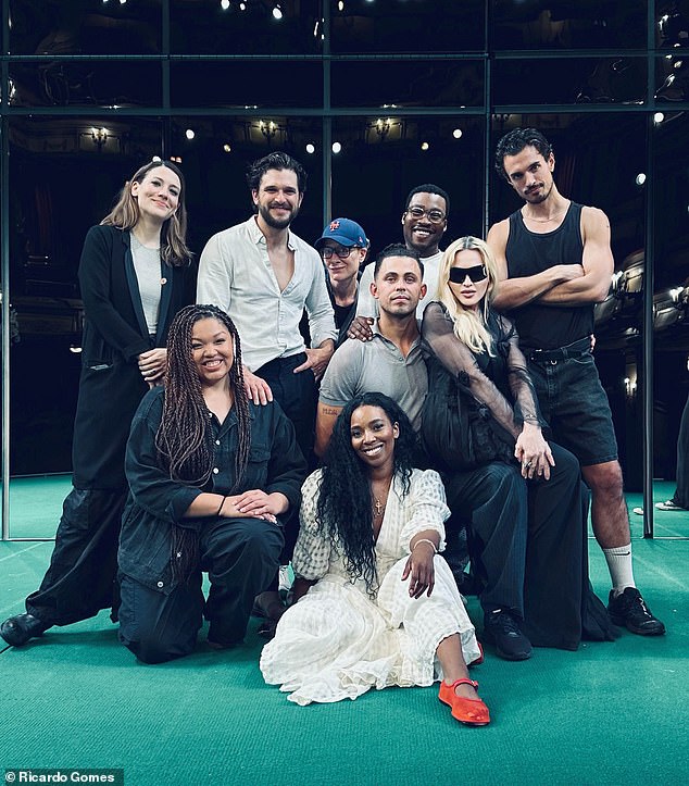 Madonna photographed with the cast of Slave