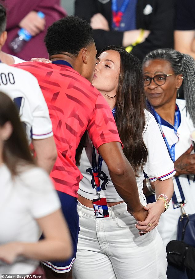 After substitute Ollie scored with seconds remaining to send the Three Lions into Sunday's final against Spain in Berlin, she celebrated her historic victory by sharing a kiss with team-mate Ellie Anderson.