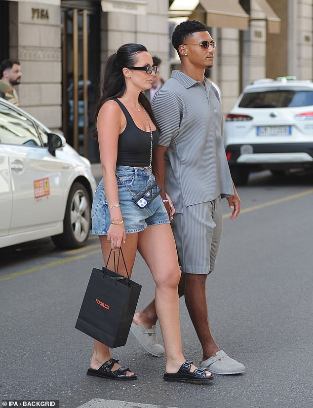 Ollie and Ellie were spotted shopping in Milan after their romantic marriage proposal on Monday