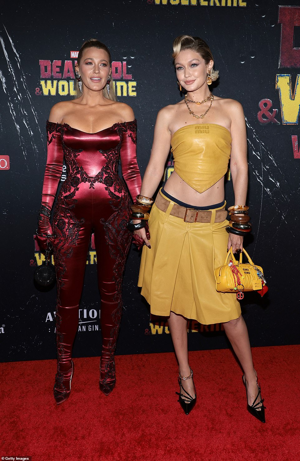 For the New York premiere of Deadpool & Wolverine, the actress, 36, donned a form-fitting off-the-shoulder jumpsuit as she posed alongside her supermodel pal, Gigi Hadid, 29.